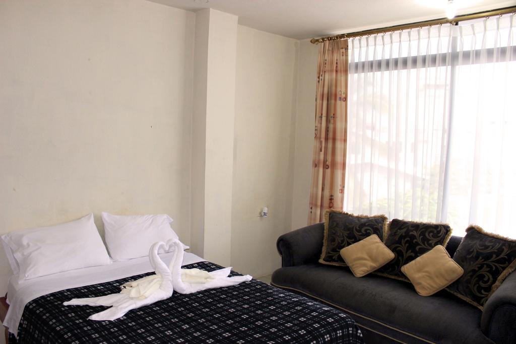 Planet House Hotel Puerto Ayora  Habitación foto