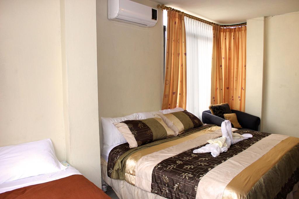 Planet House Hotel Puerto Ayora  Habitación foto